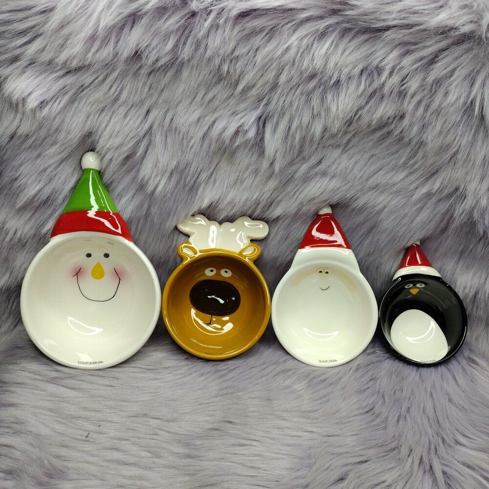 NEW Set 4 Avon Ceramic Christmas Measuring Cups Penguin Santa Reindeer Snowman
